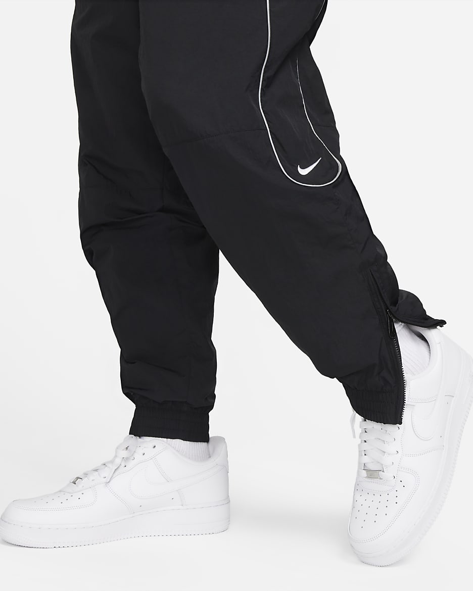 Nike tracksuit bottoms for men best sale